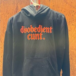 Black Hoodie with attention grabbing Red Graphic Text